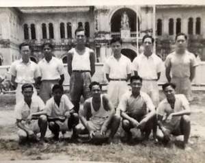 SJI football team, 1946. Father Jerry on the front row, extreme right