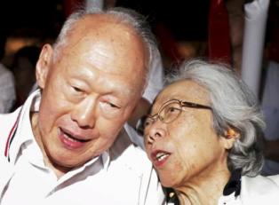 File photo shows Singapore's Minister Mentor Lee and his wife Kwa attending a May Day rally in Singapore